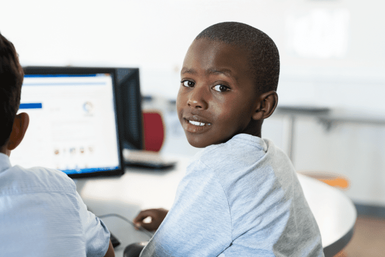 boy in the classroom , computer screen
